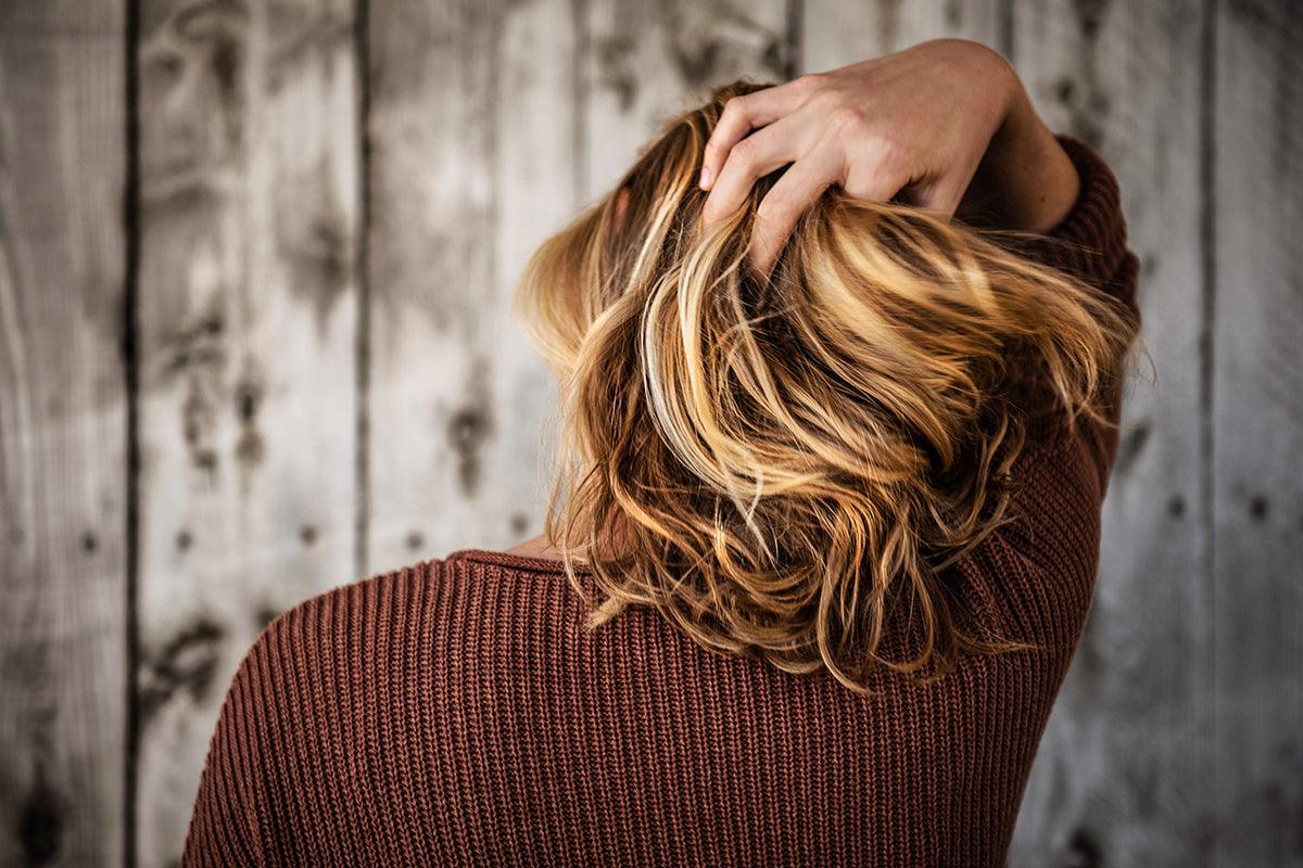 The Ins & Outs of Postpartum Hair Loss